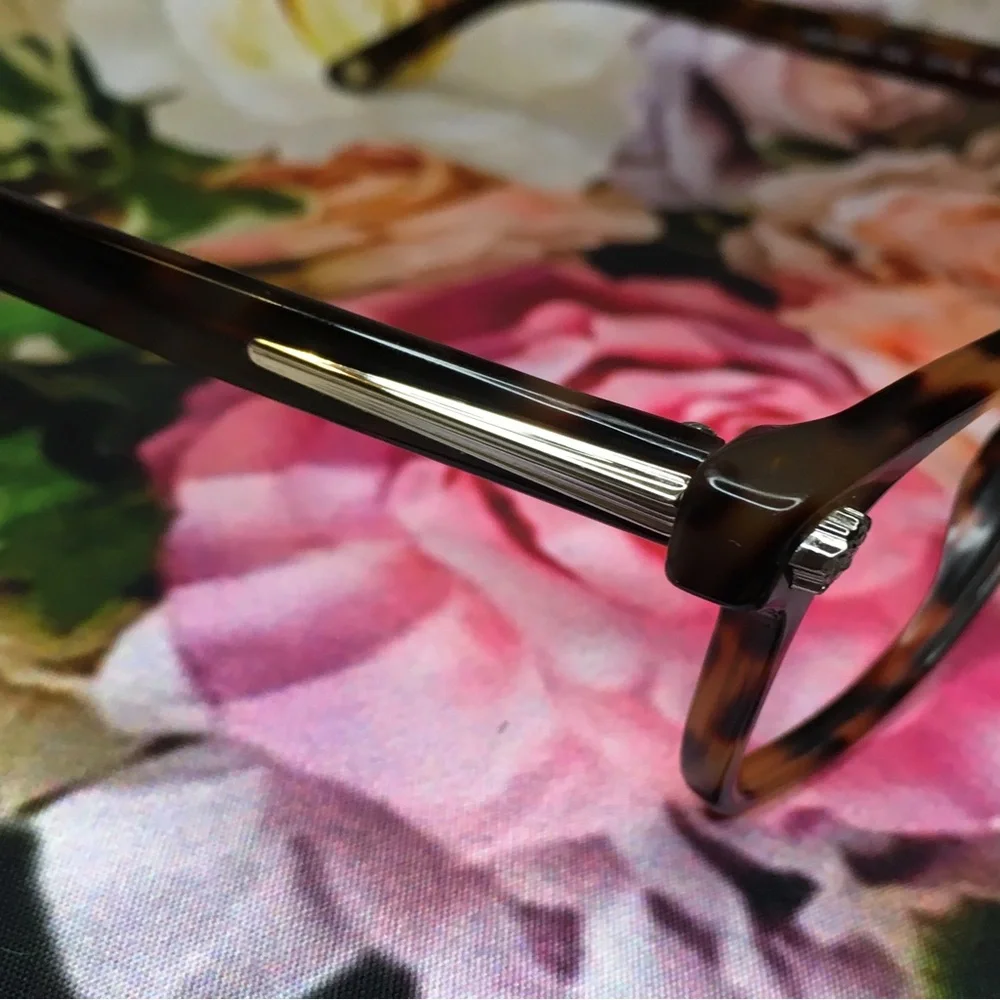 Versace orange & black tortoise frames glasses  Silver medusa face logo corners